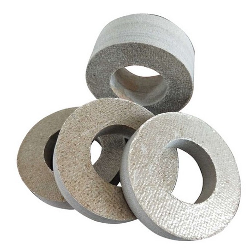 Circular mica flange gasket close-up - precision-stamped for standard pipe and flange sealing applications