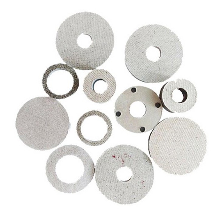 Custom-shaped mica gaskets in varied sizes - cut and stamped to customer specifications