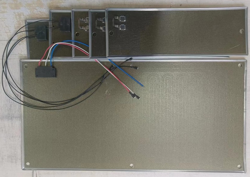 Mica heating elements in various custom shapes - flat plates, strips, and curved elements for different equipment profiles