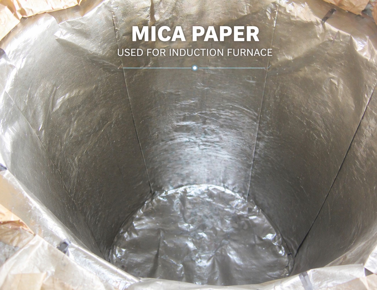 Mica insulation for steel ladle handling molten metal at 1600°C - flexible thermal barrier preventing heat loss while protecting vessel integrity