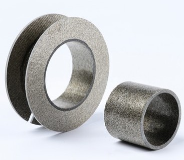 Muscovite mica tube close-up showing smooth wound construction and white mica paper layers